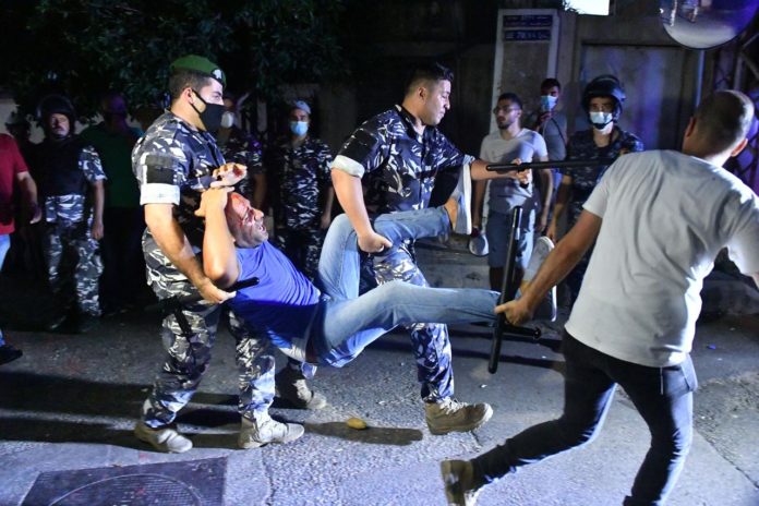 Cover image: The Lebanese Internal Security Forces while arresting a protestor in Beirut | Photo by Abbas Salman.