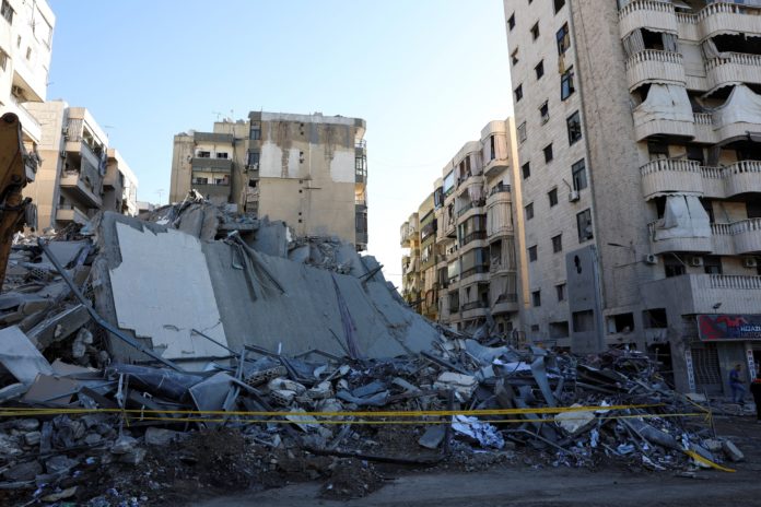 A damaged site of one of the branches of Al-Qard al-Hassan, a financial institution linked to Hezbollah, following Israeli airstrikes on October 20, 2024, in Chiyah, Lebanon. © 2024 Mohamed Azakir/Reuters